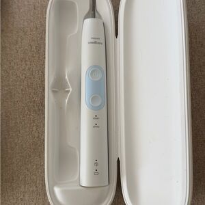 Philips Sonicare Electric Toothbrush in White with Light Blue Accents